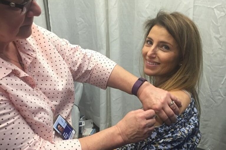 Christina Cassetti Receiving Vaccine