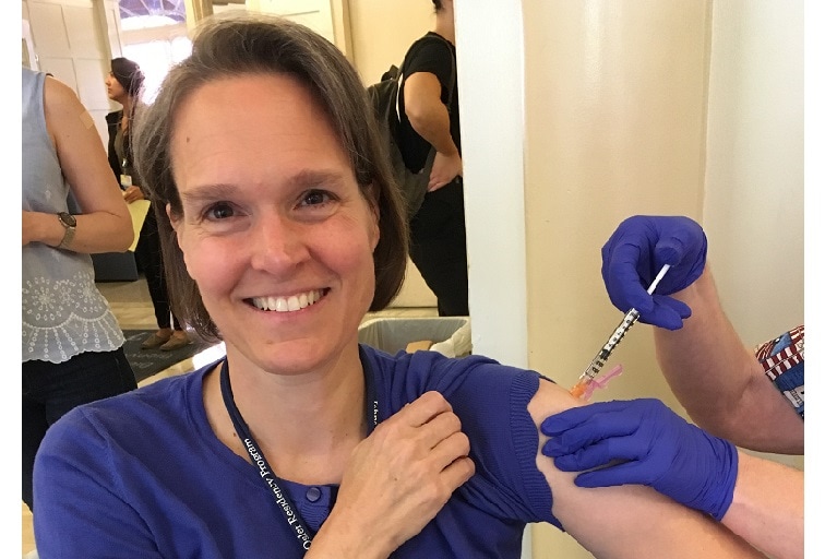 Sara E. Cosgrove Receiving Vaccine