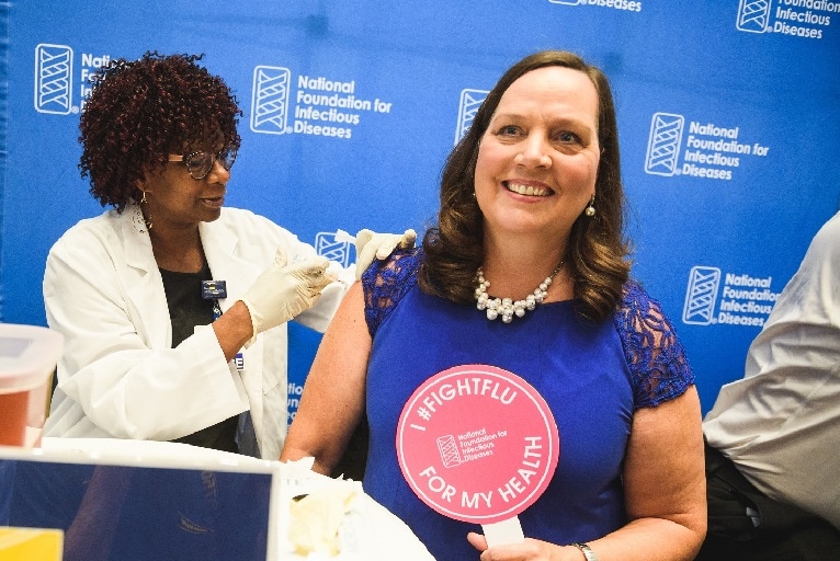 Patricia A. Stinchfield, RN, receiving her vaccine