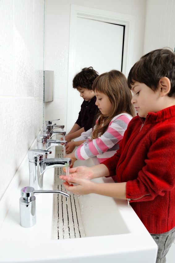 Kids washing their hands