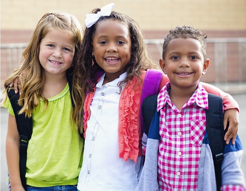 Diverse group of young kids going to school