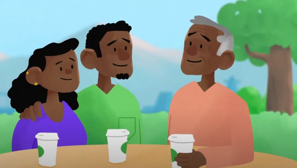 Imagen de una familia tomando café juntos al aire libre
