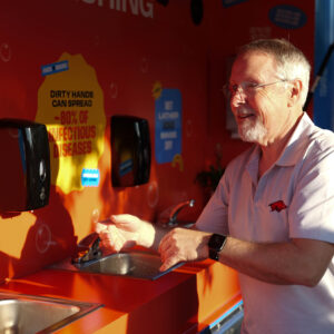 Hopkins Washing Hands NFID Medical Director Robert H. Hopkins, Jr., MD washing hands at Clean Hands Caravan