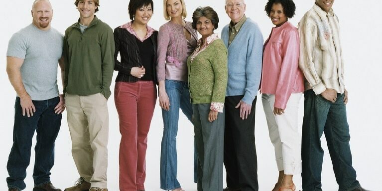 Studio Shot of a Mixed Age, Multiethnic Group of Men and Women Standing in a Line