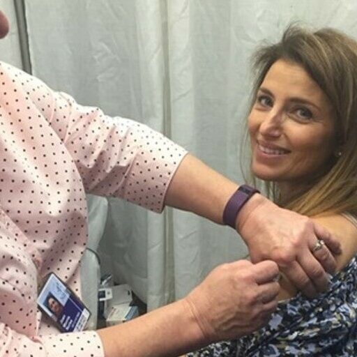 Christina Cassetti Receiving Vaccine