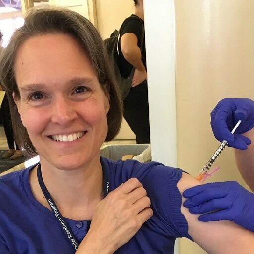 Sara E. Cosgrove Receiving Vaccine