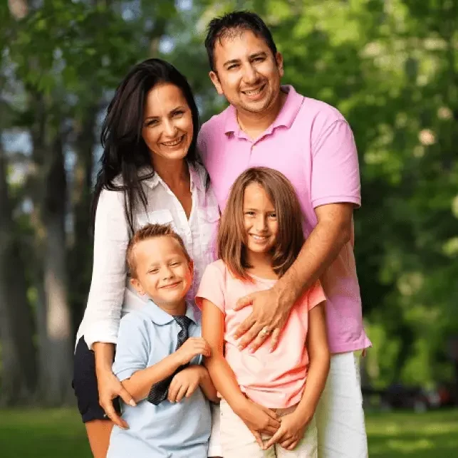 Smiling family holding eachother